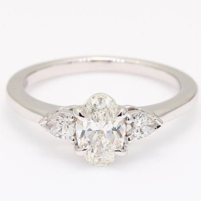 Cortina oval and pear-cut white diamond three-stone engagement ring