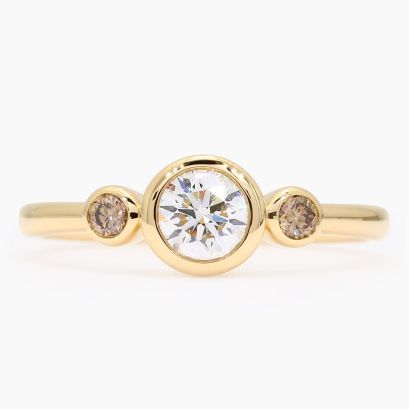 Equinox champagne and white IGI-certified trilogy bezel-set diamond ring