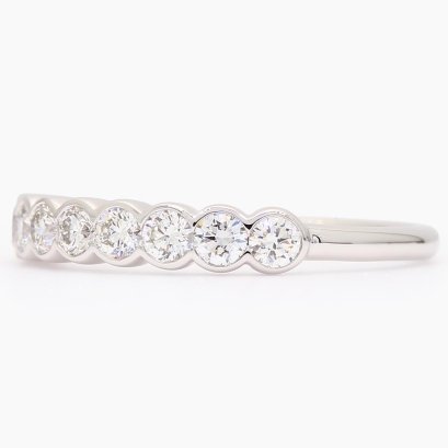 Muse white bezel-set diamond band