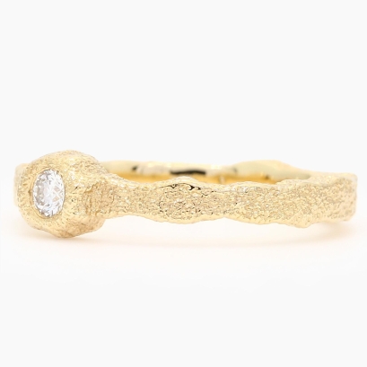 Terra white bezel-set diamond textured ring