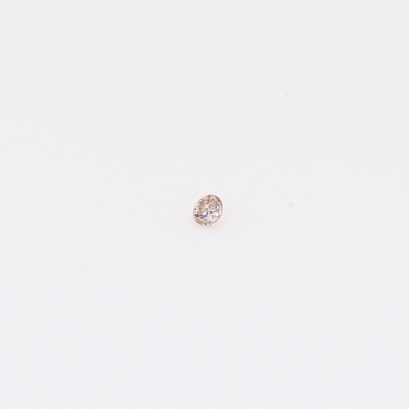 0.01 Carat round-cut Argyle intense pink champagne diamond