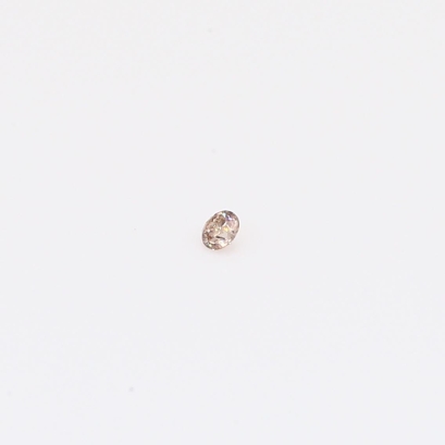 0.02 Carat round-cut Argyle intense pink champagne diamond