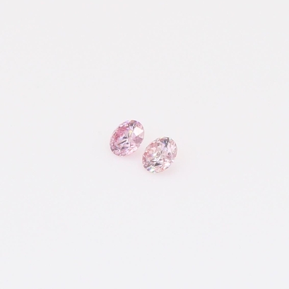 0.09 Total carat pair of round-cut FPP Argyle pink diamonds