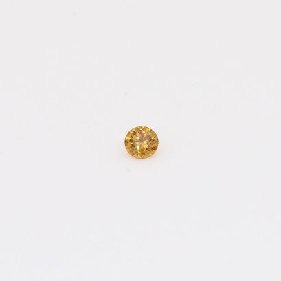 0.035 Carat round-cut fancy intense orange diamond