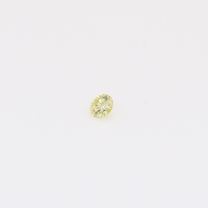 0.035 Carat round-cut fancy yellow diamond