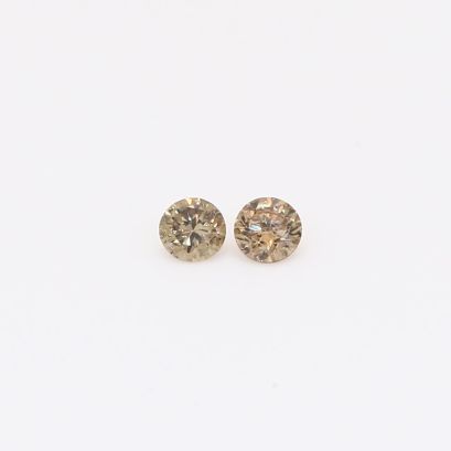 0.13 Total carat pair of round-cut champagne diamonds