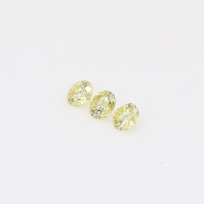 0.18 Total carat trio of round-cut fancy yellow diamonds