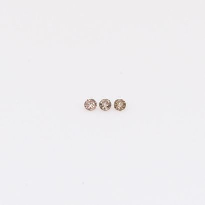 0.015 Total carat trio of round-cut champagne diamonds