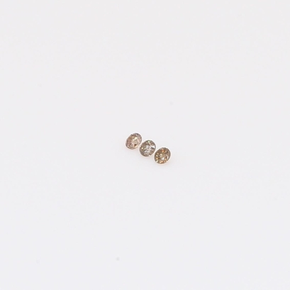 0.015 Total carat trio of round-cut champagne diamonds