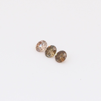 0.12 Total carat trio of round-cut champagne diamonds