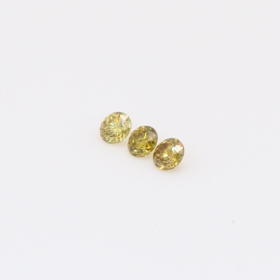 0.105 Total carat trio of round-cut fancy green diamonds
