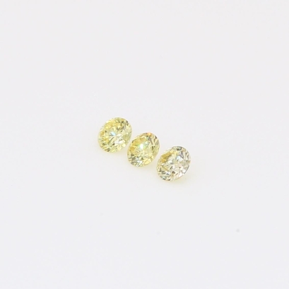 0.12 Total carat trio of round-cut fancy yellow diamonds