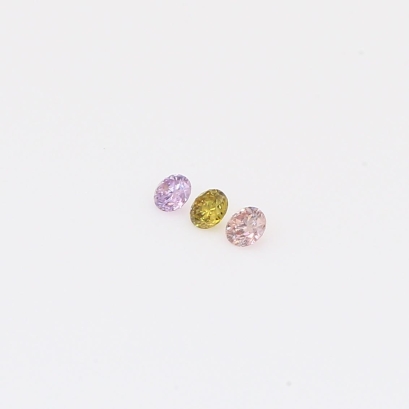 0.06 Total carat trio of round-cut rainbow diamonds