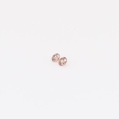 0.02 Total carat pair of round-cut Argyle intense pink champagne diamonds