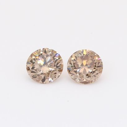 0.91 Total carat pair of brilliant-cut round champagne diamonds