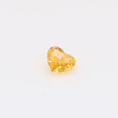 0.31 Carat heart-cut fancy yellow orange diamond