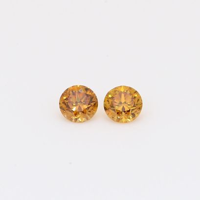 0.28 Total carat pair of brilliant-cut round fancy deep orange diamonds