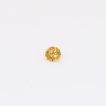 0.06 Carat brilliant-cut round fancy orange diamond