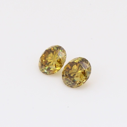 0.64 Total carat pair of brilliant-cut round fancy deep yellow green diamonds