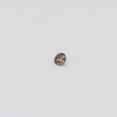 0.03 Carat round cut champagne diamond