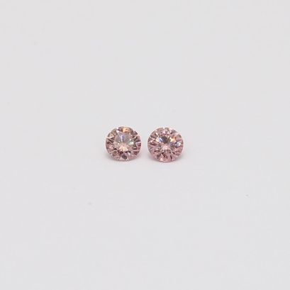 0.06 Total carat pair of round-cut FIPP Argyle pink diamonds