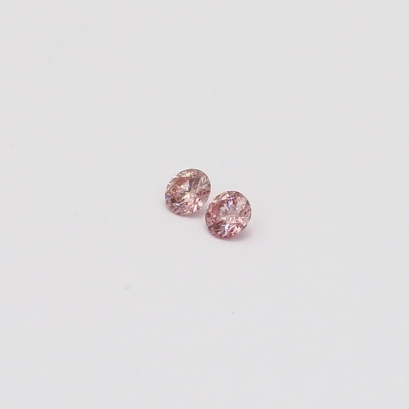 0.06 Total carat pair of round-cut FIPP Argyle pink diamonds