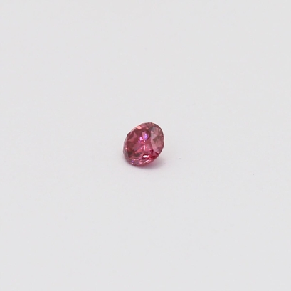 0.08 Carat round-cut FDP GIA and Delta-certified pink diamond