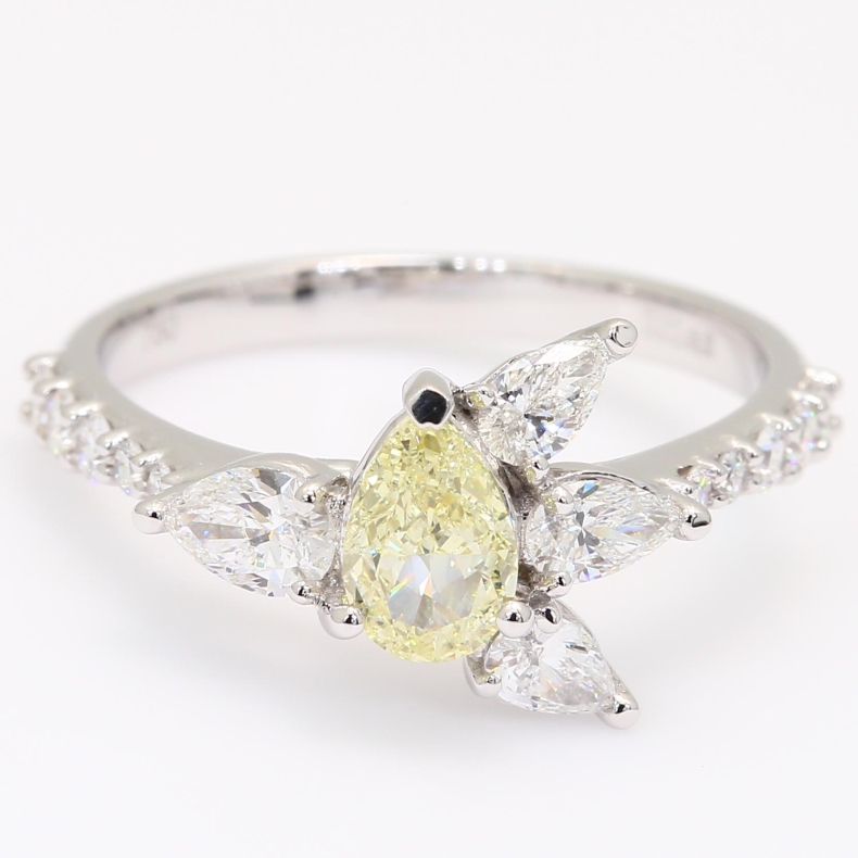 Theresa pear and round-cut fancy yellow and white diamond ring