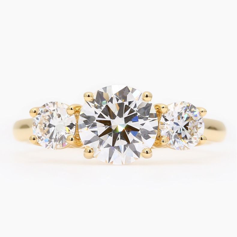 Light 2.2 carat brilliant-cut round white lab-grown three-stone diamond ring