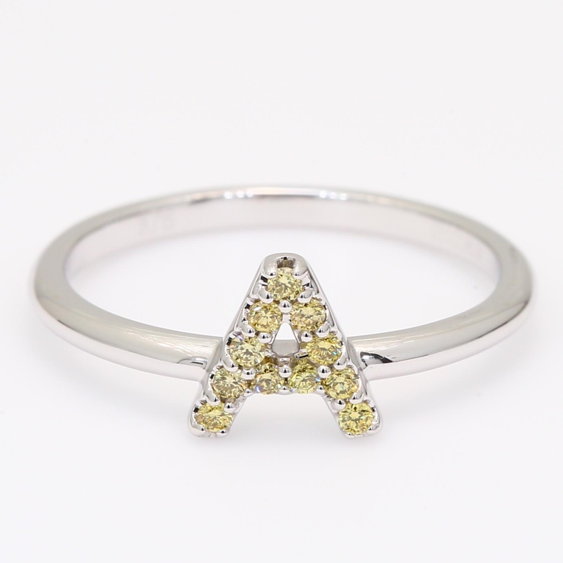 Love Letter A fancy yellow diamond ring