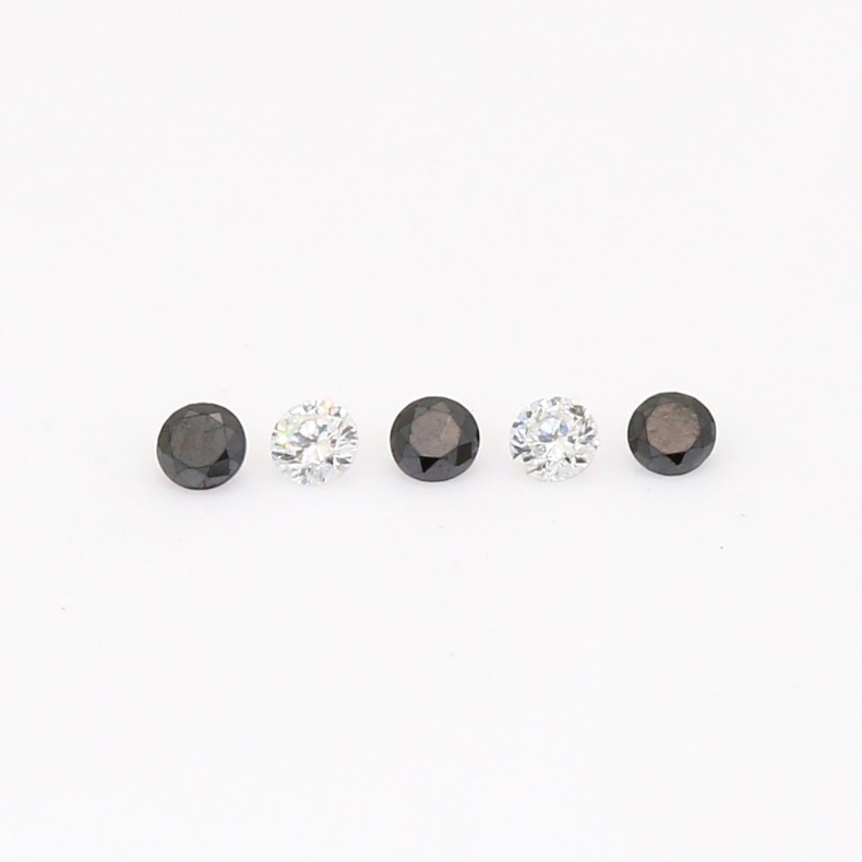 0.10 Total carat parcel of round cut black and white diamonds