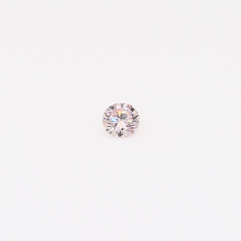 0.06 Carat round-cut FP Argyle pink diamond