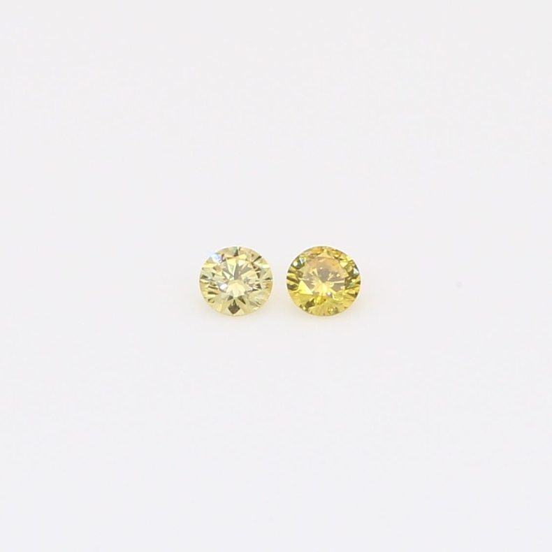 0.08 Total carat pair of round-cut fancy yellow diamonds
