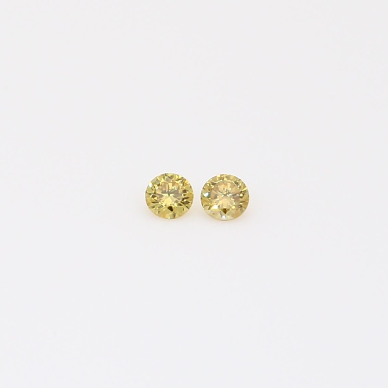 0.06 Total carat pair of round-cut fancy yellow diamonds