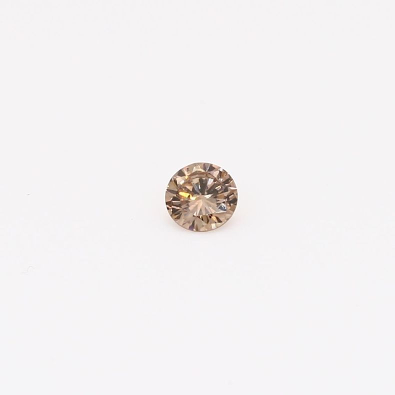 0.11 Carat round-cut champagne diamond