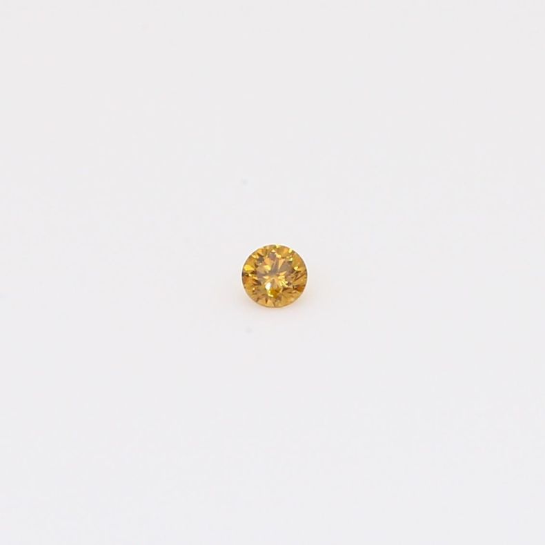 0.035 Carat round-cut fancy intense orange diamond
