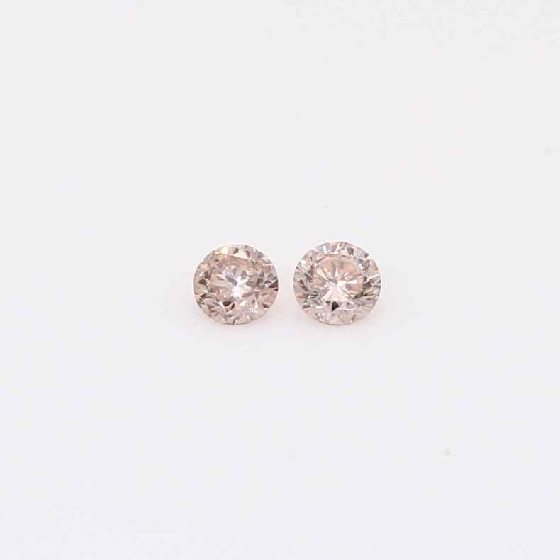 0.14 Total carat pair of round-cut Argyle intense pink champagne diamonds