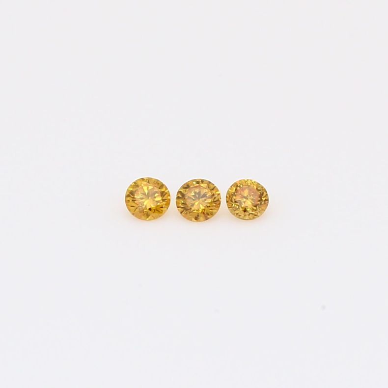 0.09 Total carat trio of round-cut fancy intense orange diamonds
