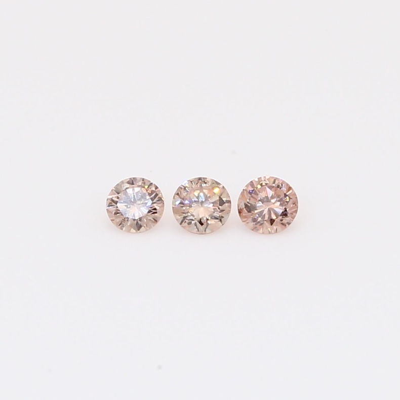 0.18 Total carat trio of round-cut Argyle intense pink champagne diamonds