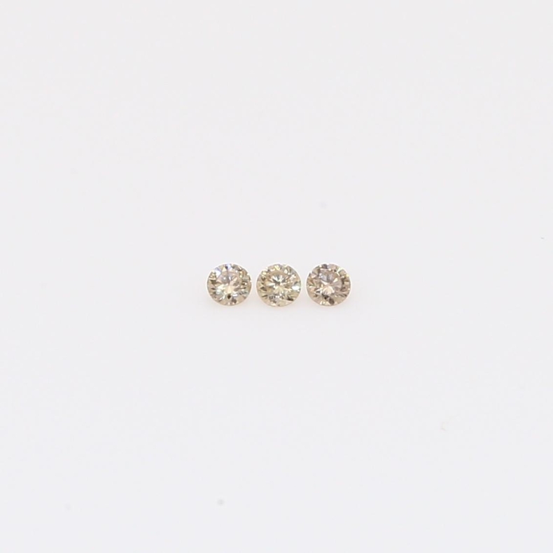 0.03 Total carat trio of round-cut champagne diamonds