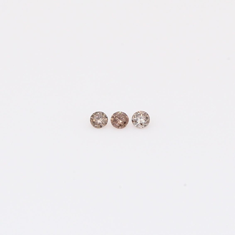 0.027 Total carat trio of round-cut champagne diamonds