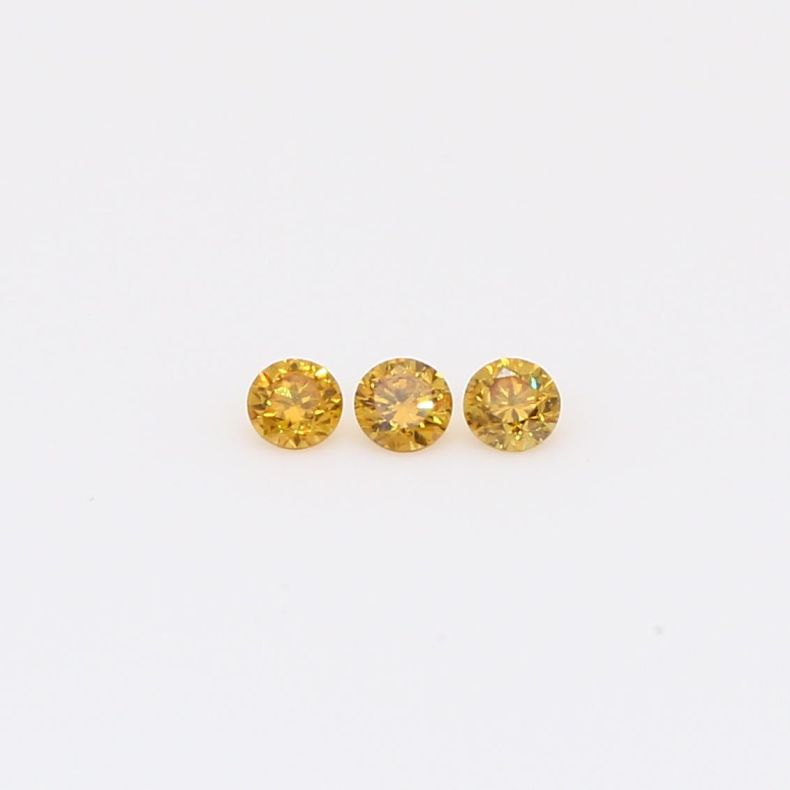 0.105 Total carat trio of round-cut fancy intense orange diamonds