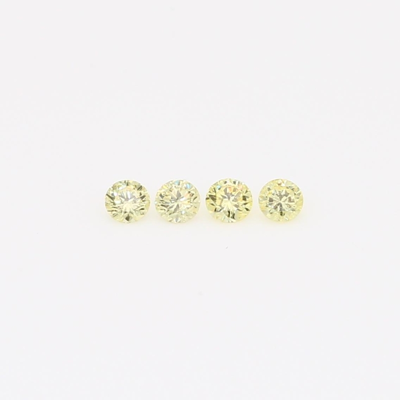 0.12 Total carat parcel of round-cut fancy yellow diamonds