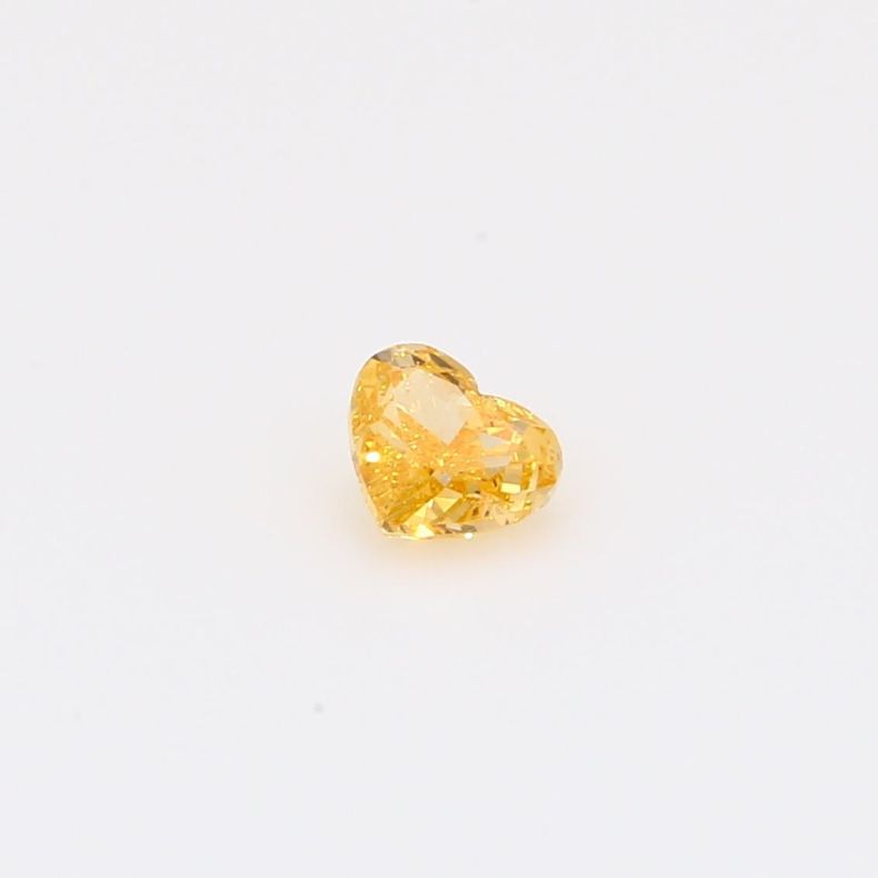 0.31 Carat heart-cut fancy yellow orange diamond