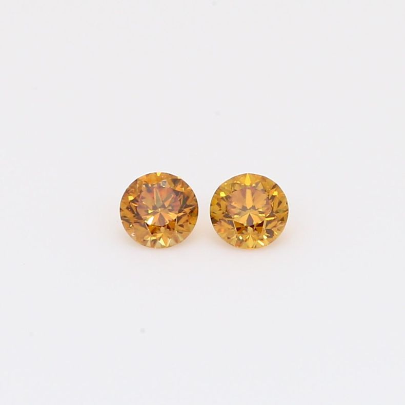 0.28 Total carat pair of brilliant-cut round fancy deep orange diamonds