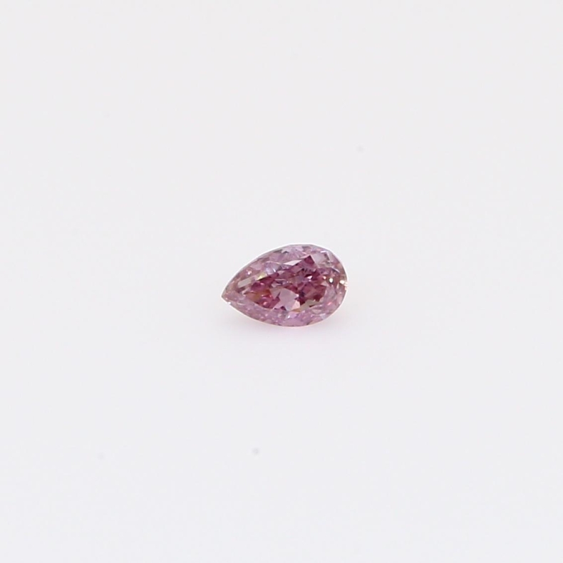0.12 Carat pear-cut fancy deep orange pink diamond