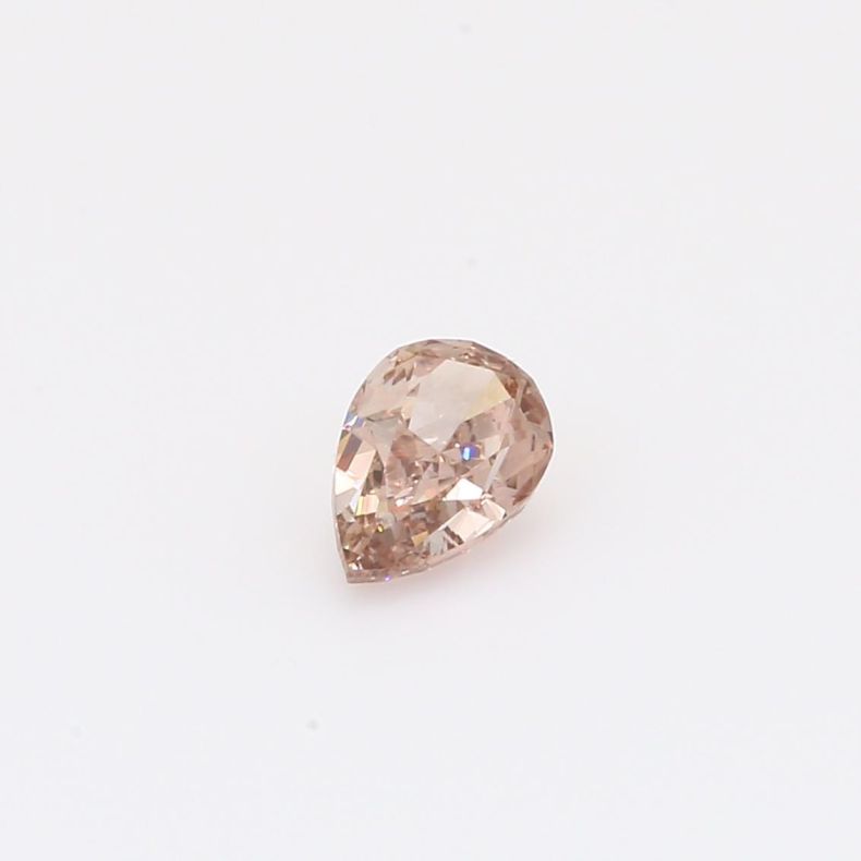 0.52 Carat pear-cut fancy orange pink diamond