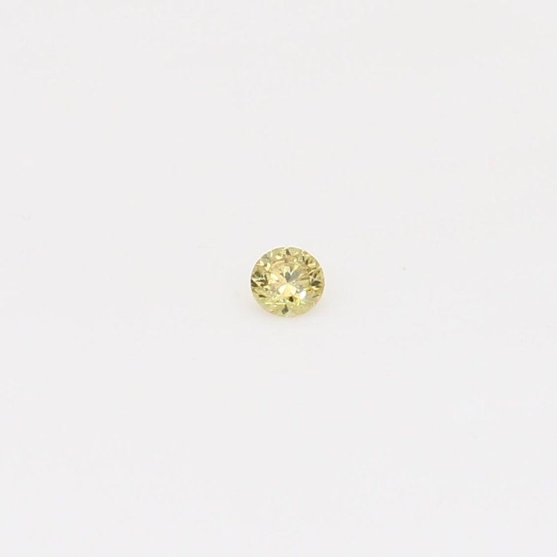 0.04 Carat round-cut fancy yellow diamond