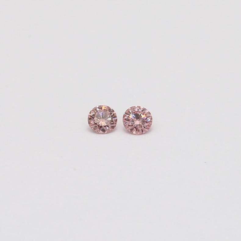 0.06 Total carat pair of round-cut FIPP Argyle pink diamonds