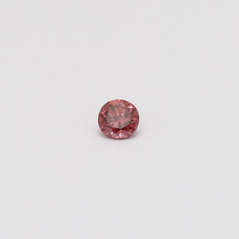 0.10 Carat round cut origin and GIA certified fancy deep pink diamond